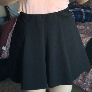 black brandy melville mini skirt